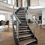 Building Luxury Villa Lobby Double Steel Plate Stringer Curved Tread Arc Staircase with Glass Railing